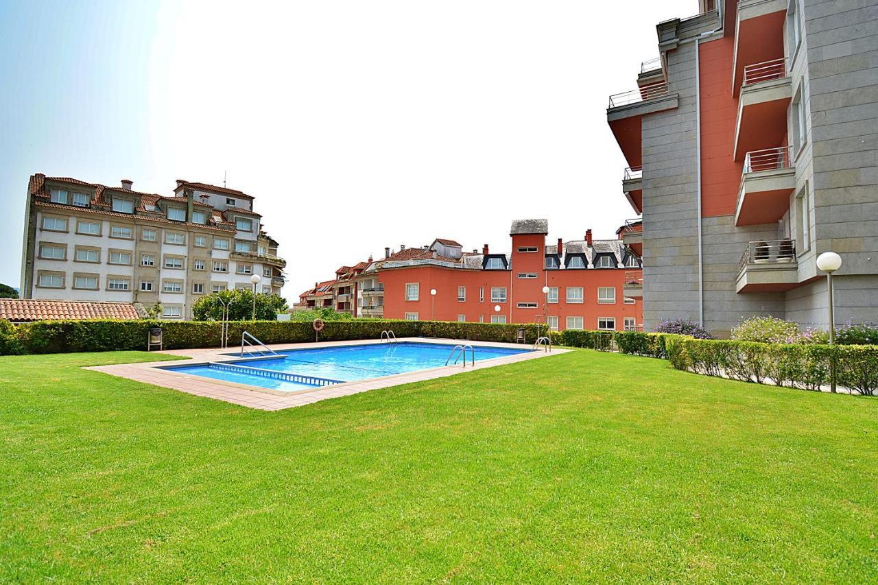 Galihost - Apartamento Con Piscina En El Centro De Sanxenxo Zewnętrze zdjęcie